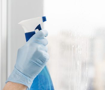 woman-cleaning-window